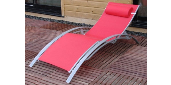 Sun Lounger with red textilene material and grey aluminium frame
