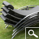 Sun Lounger with green textilene material and grey aluminium frame Sun Lounger with green textilene material and grey aluminium frame